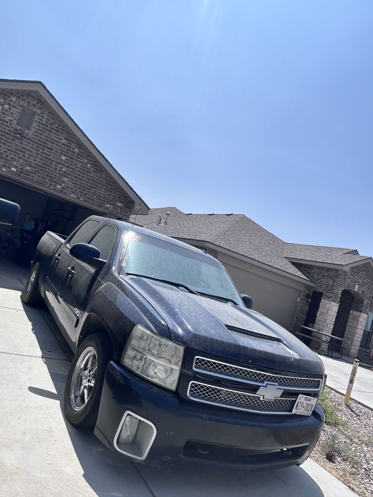 Dust covered Chevrolet Silverado before Black Label exterior detail