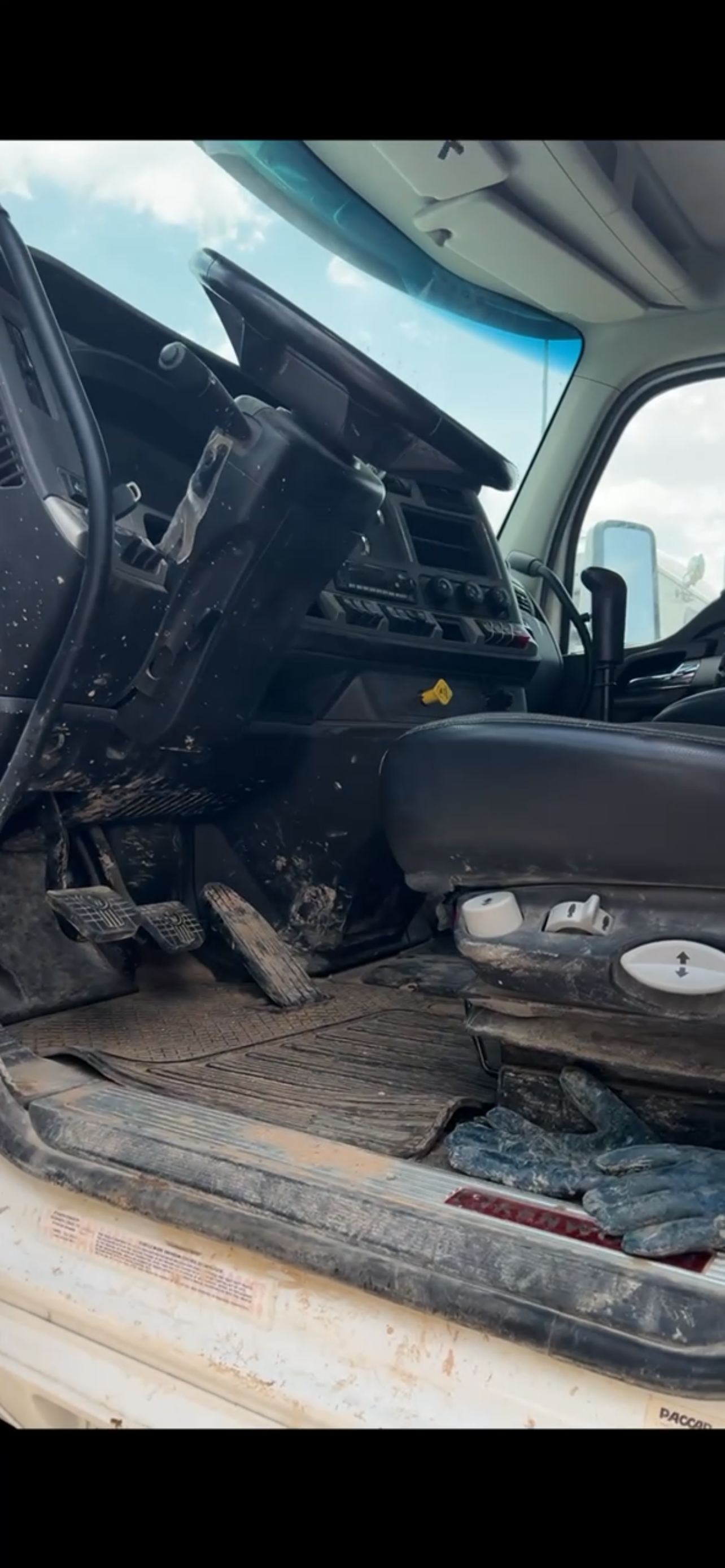 Dirty semi truck cab interior before detail, second unit